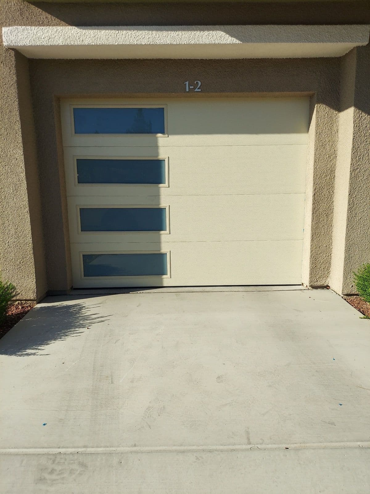 Stylish Garage Door Upgrade with Modern Windows image